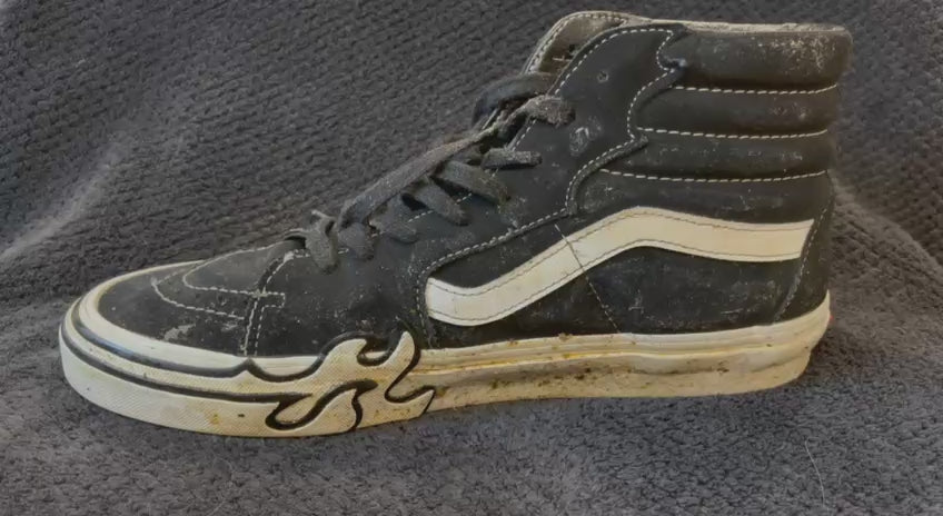Load video: video showing cleaning dirty sneakers with foam shoe cleaner and brush